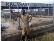 Mr. Oderinwale at the Kalahari Red Goats Project Farm