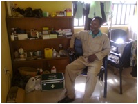 Mr. Oderinwale in an office where veterinary drugs are kept at the Kalahari Red Goats Project Farm 