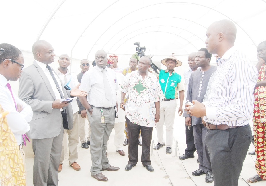 The Vice-Chancellor, Prof. Kolawole Salako (2nd from left) making some observation at the CEADESE Screen House during the inspection tour, while other members of the inspection team pay attention